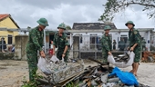 Troops and militiamen help people surmount storm aftermaths